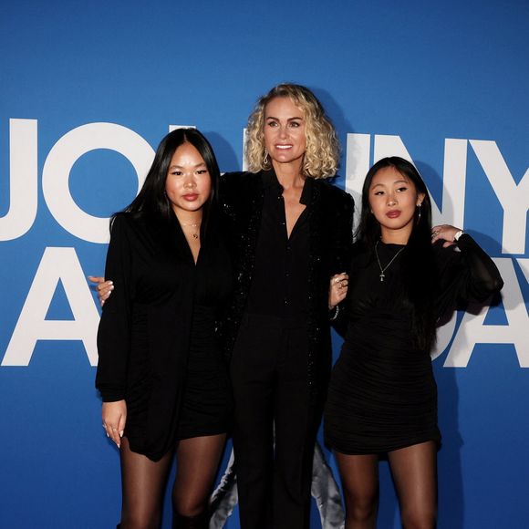 Laeticia Hallyday et ses filles Joy et Jade - Photocall du vernissage de l'exposition "Johnny Hallyday, l'exposition" au Palais des Expositions à Paris. Le 21 décembre 2023
© Dominique Jacovides / Bestimage
