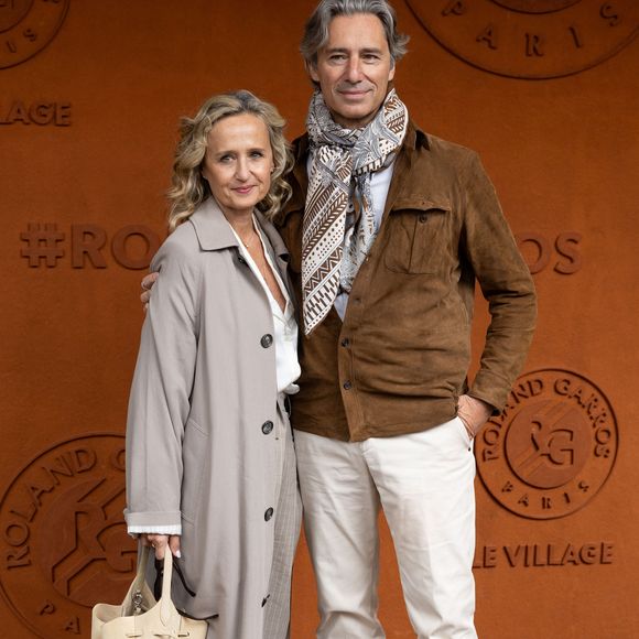 Laurent Solly et sa femme Caroline Roux au photocall du village lors des Internationaux de France de Tennis de Roland Garros 2026, à Paris, France, le 5 juin 2026. © Jacovides-Moreau/Bestimage