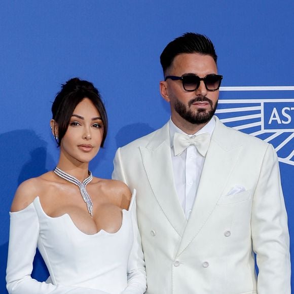 Nabilla Benattia et son mari Thomas Vergara - Photocall du gala de l'AmFar à l'Hôtel du Cap-Eden-Roc, Antibes, lors du 76ème Festival International du Film de Cannes. © Moreau-Jacovides / Bestimage