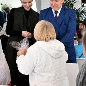 Le prince Albert II de Monaco, sa femme la princesse Charlene et Camille Gottlieb ont remis les traditionnels colis de Noël aux aînés monégasques dans la meeting room du Yacht Club de Monaco dans le cadre de festivités de fin d'année de la Principauté de Monaco, le 12 décembre 2024. © Bruno Bebert/Pool Monaco/Bestimage