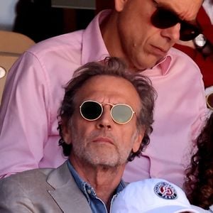 Stéphane Freiss et sa compagne Delphine Horvilleur dans les tribunes des Internationaux de France de tennis de Roland Garros 2024 à Paris le 7 juin 2024.

© Jacovides-Moreau/Bestimage
