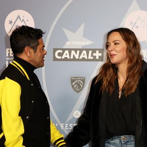 Jamel Debbouze et sa femme Mélissa Theuriau - Tapis rouge lors du 29ème Festival International du Film de Comédie de l'Alpe d'Huez le 21 Janvier 2026. © Dominique Jacovides/Bestimage