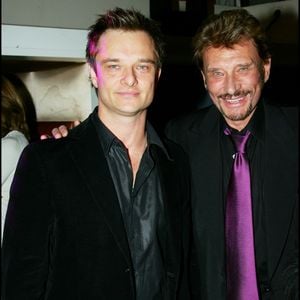 Exclusif - David Hallyday et Johnny Hallyday lors de la fête organisée pour la signature du nouveau contrat de Johnny Hallyday avec la maison de disque Warner au restaurant La maison blanche à Paris.
Crédit : ANGELI-RINDOFF / BESTIMAGE