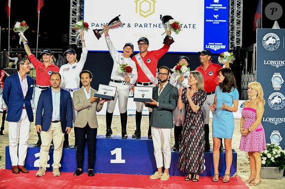 La princesse Caroline de Hanovre, sa fille Charlotte Casiraghi, son fils, né de son union avec Gad Elmaleh, Raphael, la princesse Alexandra de Hanovre, son fiancé Ben-Sylvester Strautmann, Melanie de Massy et Diane Fissore, la présidente du jumping et de la Fédération monégasque d’équitation, ont assisté à la 2eme journée du Jumping International de Monte-Carlo, le 4 juillet 2024. La compétition se déroule sur le port Hercule à Monaco, du 3 juillet au 5 juillet. La princesse Caroline, sa fille Charlotte et Diane Fissore, ont remis le 1er prix de la Longines Pro-Am Cup au profit de l'AMADE et recupéré un chèque de 20000 Euros pour l'associarion fondée en 1963 par la princesse Grace de Monaco en faveur de la protection et de l’épanouissement des enfants. C'es le binôme composé de Giacomo Paneraj (MON) et Felipe Coutinho Mendonca Nagata (BRE), pour la Team Paneraj & Partner Estate qui ont pris la première place. © Bruno Bebert/Bestimage