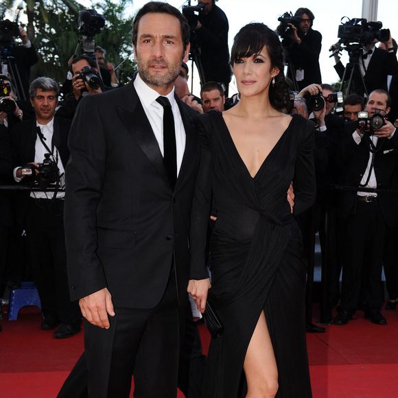 Gilles Lellouche et Melanie Doutey arrivent pour la projection de 'The Artist' présenté en compétition dans la section des longs métrages dans le cadre du 64ème Festival International du Film de Cannes, au Palais des Festivals à Cannes, sud de la France le 15 mai 2011. Photo by Hahn-Nebinger-Genin/ABACAPRESS.COM