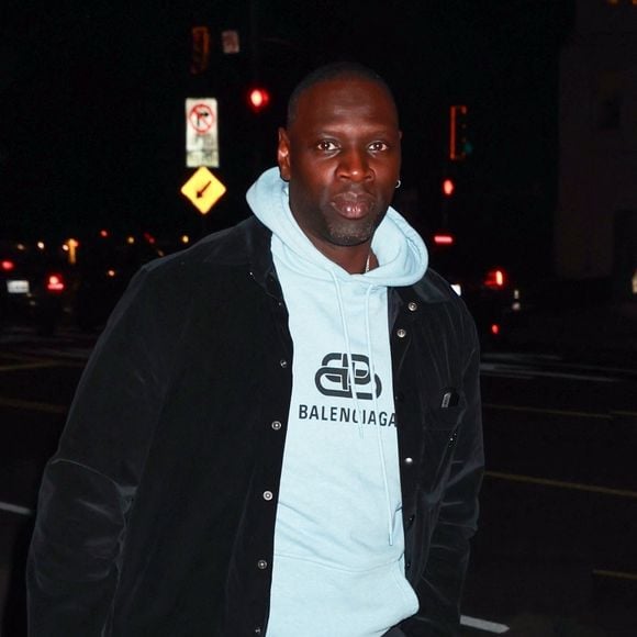Santa Monica, CA  - EXCLUSIVE  - French actor Omar Sy was spotted dining at Giorgio Baldi in Santa Monica. The Lupin star looked effortlessly stylish in a blue Balenciaga hoodie, black jacket, and dark gray trousers during his evening out.



Pictured: Omar Sy