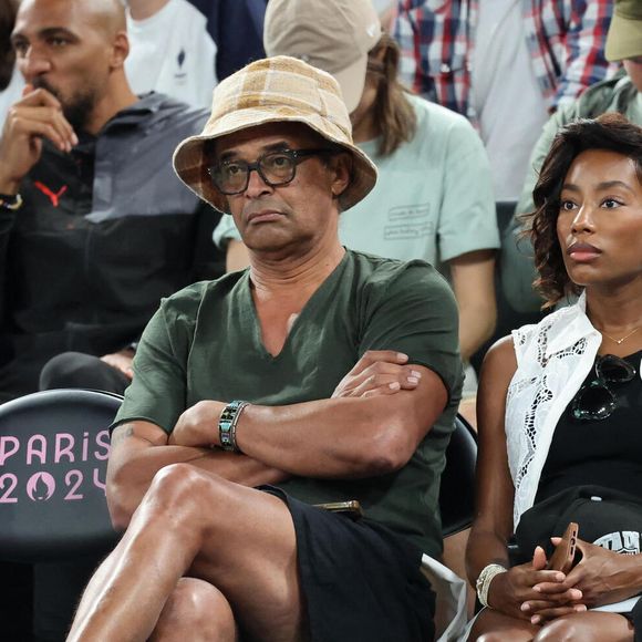 Yannick Noah et sa compagne Malika - Les célébrités en tribunes pendant l'épreuve de basketball de Demi-Finale opposant la France à l'Allemagne lors des Jeux Olympiques de Paris 2024 (JO) à l'Arena Bercy, à Paris, France, le 8 août 2024. © Jacovides-Perusseau/Bestimage