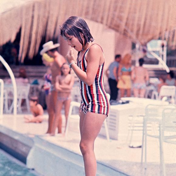 Un nom soufflé par le prince Rainier, comme le confie l'associée de Stéphanie de Monaco.

Archives - Stéphanie de Monaco à la piscine AGENCE / BESTIMAGE