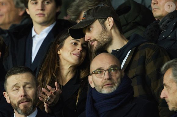 Exclusif - Louis Sarkozy et sa femme Natali Husic   - People en tribunes du match de Ligue 1 Uber Eats "PSG contre Reims" (1-1) au Parc des Princes à Paris le 29 janvier 2023. © Bestimage
