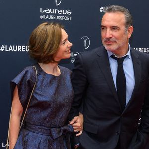 L'acteur Jean Dujardin et la danseuse sur glace Nathalie Pechalat arrivent au tapis rouge des Laureus World Sport Awards Paris 2023 à la Cour Vendôme le 08 mai 2023 à Paris, France. Photo by ABACAPRESS.COM