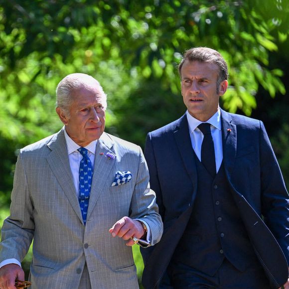 Déambulation d'Emmanuel Macron, président de la République Française, et de la Première dame Brigitte Macron, dans les jardins du château de Windsor avec le roi Charles III d'Angleterre et Camilla Parker Bowles, reine consort, le 9 juillet 2025.  © Jeanne Accorsini / Pool / Bestimage