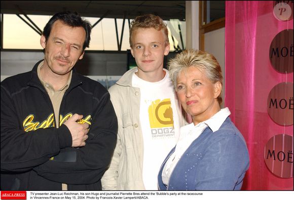 Le présentateur de télévision Jean-Luc Reichmann, son fils Hugo et la journaliste Pierrette Bres assistent à la soirée 'Bubble' à l'hippodrome de Vincennes-France le 15 mai 2004. Photo par Francois-Xavier Lamperti/Abaca