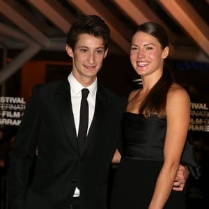 Pierre Niney et sa compagne Natasha Andrews (bijoux Montblanc) - Ouverture du 13e Festival International du Film de Marrakech, le 29 novembre 2013. © DOMINIQUE JACOVIDES / BESTIMAGE