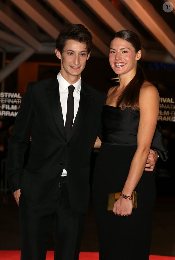 Pierre Niney et sa compagne Natasha Andrews (bijoux Montblanc) - Ouverture du 13e Festival International du Film de Marrakech, le 29 novembre 2013. © DOMINIQUE JACOVIDES / BESTIMAGE