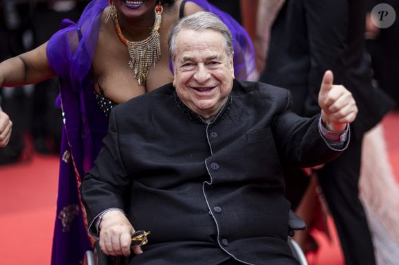 Paul-Loup Sulitzer - Montée des marches du film « Les Amandiers » lors du 75ème Festival International du Film de Cannes. Le 22 mai 2022
© Cyril Moreau / Bestimage