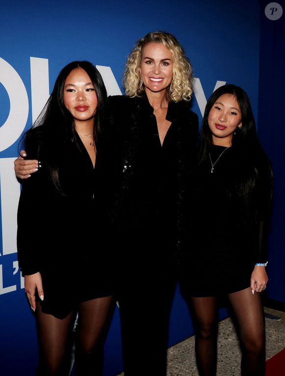 Laeticia Hallyday et ses filles Joy et Jade - Photocall du vernissage de l'exposition "Johnny Hallyday, l'exposition" au Palais des Expositions à Paris. © Dominique Jacovides / Bestimage