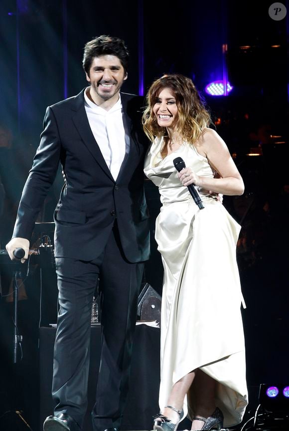 Depuis ses débuts, Julie Zenatti a tracé un parcours lumineux dans la chanson française, se faisant rapidement remarquer pour son talent.
Patrick Fiori et Julie Zenatti – Notre-Dame de Paris – concert hommage avec la participation de 70 musiciens et 40 choristes au Palais Omnisports de Paris Bercy à Paris.
Agence Bestimage