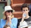 Le cadet, Tadeo, est associé à ses côtés dans une société.

Julie Gayet et son fils - People dans les tribunes des Internationaux de France de Tennis de Roland Garros à Paris. Le 9 juin 2018. © Cyril Moreau / Bestimage