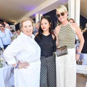 La cheffe Hélène Darroze, Laeticia Hallyday et sa fille Joy dans l'Espace VIP lors de la 9ème édition du "Longines Paris Eiffel Jumping" au Champ de Mars à Paris, France, le 25 juin 2023. © Perusseau-Veeren/Bestimage