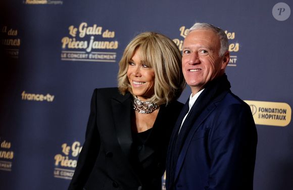 Exclusif - Brigitte Macron, présidente de la Fondation des Hôpitaux et Didier Deschamps, parrain de l’opération Pièces Jaunes au photocall du "Gala des pièces jaunes, le concert événement" à Paris La Défense Arena à Nanterre le 23 janvier 2025. Le gala des Pièces Jaunes 2025 sera diffusé le 28 janvier, sur France 2 et sur la plateforme France.Tv.

© Jacovides / Moreau / Bestimage