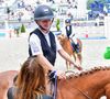 Elle a pris part à la 11e édition du Longines Paris Eiffel Jumping, dans la catégorie junior. 

Carla Bruni et sa fille Giulia Sarkozy après le prix Kids Cup L’Envol dans l'Espace VIP lors de la 10ème édition du "Longines Paris Eiffel Jumping" à la Plaine de Jeux de Bagatelle à Paris, France, le 21 juin 2024. © Perusseau-Veeren/Bestimage