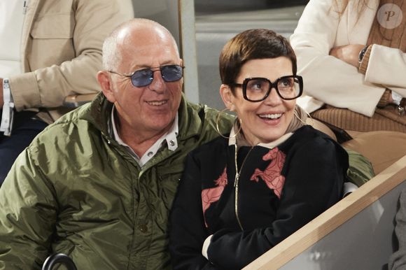 Frédéric Cassin et sa femme Cristina Córdula dans les tribunes (night session) des Internationaux de France de tennis de Roland Garros 2024 à Paris, France, le 1er juin 2024. © Jacovides-Moreau/Bestimage
