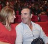 Habituées à ce rythme depuis leur plus jeune âge, ses filles comprennent ses contraintes professionnelles. 

Nathalie Pechalat et son mari Jean Dujardin - People à la représentation exceptionnelle du spectacle musical "Sur la route Enchantée" de Chantal Goya au Palais des Congrès de la Porte Maillot à Paris - © Jack Tribeca / Bestimage