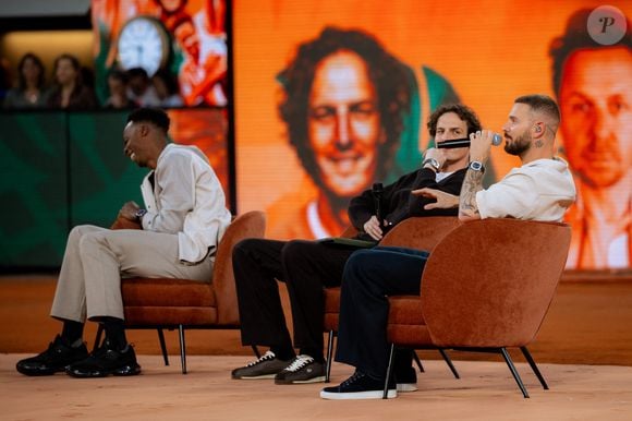 Le tennisman a d'ailleurs pu compter sur la présence de ses amis lors de cet ultime match

Gael Monfils, Matt Pokora et Paul de Saint-Sernin lors de la soirée Gael et ses amis de la 4ème journée de qualification de Roland-Garros 2026 à Roland Garros le 20 mai 2026 à Paris, France. © Pauline Figuet/Sport Press Photo via ZUMA Press/Bestimage