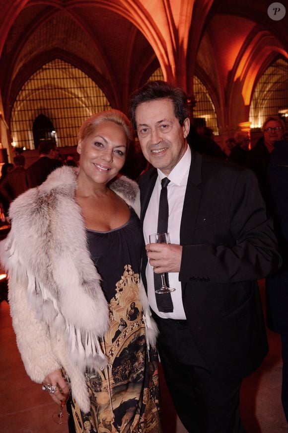 Exclusif - Hermine de Clermont-Tonnerre et Georges Fenech (député du Rhône LR) au vernissage de l'exposition photos "Libres et égales" à l'occasion de la journée internationale des droits des femmes sur les grilles de la cour d'appel à Paris, France, le 6 mars 2020. © Rachid Bellak/Bestimage