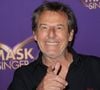 Il estime que le succès de l'émission repose sur la sincérité et la fidélité.

Jean-Luc Reichmann - Photocall officiel, organisé par TF1 et Musée Grévin,  de la soirée "Watch Party" de lancement de la nouvelle saison de Mask Singer au Musée Grévin à Paris le 24 Avril 2026.
© Guirec Coadic / Bestimage