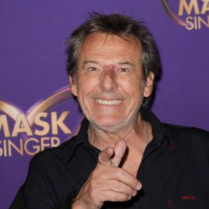 Il estime que le succès de l'émission repose sur la sincérité et la fidélité.

Jean-Luc Reichmann - Photocall officiel, organisé par TF1 et Musée Grévin,  de la soirée "Watch Party" de lancement de la nouvelle saison de Mask Singer au Musée Grévin à Paris le 24 Avril 2026.
© Guirec Coadic / Bestimage