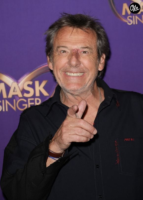 Il estime que le succès de l'émission repose sur la sincérité et la fidélité.

Jean-Luc Reichmann - Photocall officiel, organisé par TF1 et Musée Grévin,  de la soirée "Watch Party" de lancement de la nouvelle saison de Mask Singer au Musée Grévin à Paris le 24 Avril 2026.
© Guirec Coadic / Bestimage