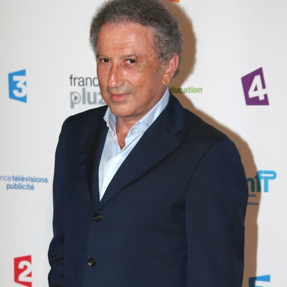 Michel Drucker - Photocall de la conference de presse de rentree de France TV au Palais de Tokyo le 27/08/2013