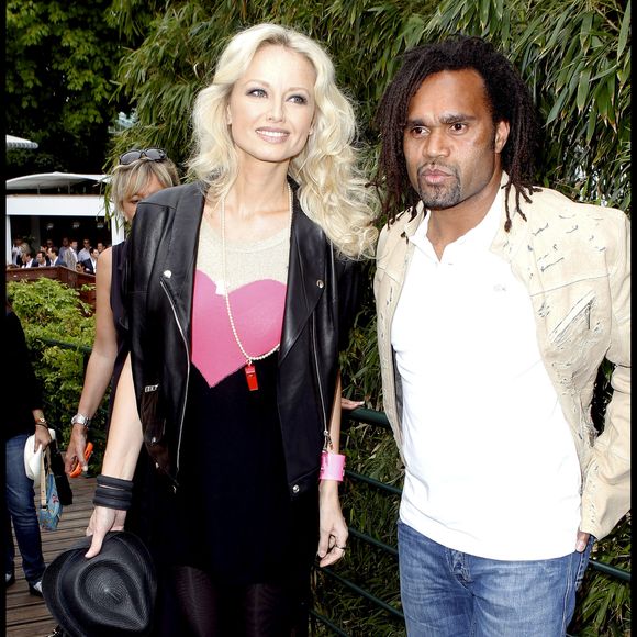 Adriana et Christian Karembeu lors de Roland-Garros en 2010. RINDOFF-JACOVIDES / BESTIMAGE