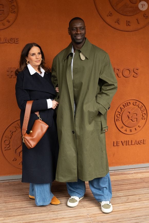 Hélène Sy et Omar Sy posent à Roland-Garros, le 7 juin 2025, à Paris. Photo : Laurent Zabulon/ABACAPRESS.COM