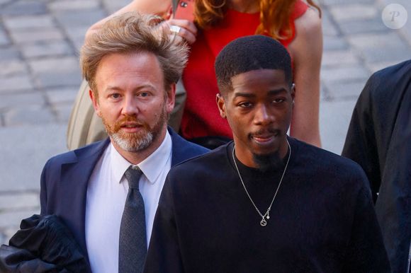 Même verdict pour le jugement en appel

Le rappeur français MHD (Mohamed Sylla), arrive avec ses avocats Antoine Vey et Elise Arfi à l'ouverture de son procès et de celui de huit autres hommes pour un meurtre commis lors d'une bagarre entre deux gangs rivaux à Paris en 2018, au Palais de Justice de Paris, France, le 4 septembre 2023. L'artiste et quatre coaccusés comparaîtront libres, trois autres sont toujours en détention provisoire et le dernier, toujours en liberté, sera jugé par contumace. Ils risquent jusqu'à 30 ans de prison. © Christophe Clovis/Bestimage