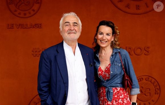 Aux États-Unis, il dirige une table d'exception implantée au cœur du célèbre hôtel Caesars Palace.

Guy Savoy et sa compagne Laetitia Barlerin - Les célébrités au photocall du village lors des Internationaux de France de Tennis de Roland Garros 2026. Paris, le 31 mai 2026. © Jacovides / Bestimage