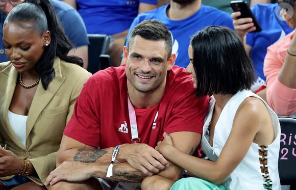 Florent Manaudou et Lola Duménil - Les célébrités assistent à la victoire de l'équipe de France de basket face au Canada (82-73) lors des Jeux Olympiques de Paris2024, le 6 août 2024. © Jacovides-Perusseau / Bestimage