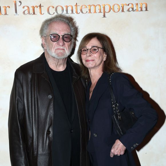 Eddy Mitchell et sa femme Muriel Bailleul - " Voir venir Venir voir ", Célébration des 40 ans de la Fondation Cartier pour l'art contemporain avec la " Traversée du chantier de la nouvelle Fondation Cartier ", place du Palais Royal, dont l'ouverture se fera en décembre 2025. Paris, France, le 18 octobre 2024. © Bertrand Rindoff/Bestimage