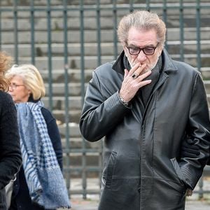 Eddy Mitchell, sa femme Muriel et sa fille Maryline - Sorties de l'église de la Madeleine après les obsèques de Johnny Hallyday à Paris, le 9 décembre 2017. © Coadic Guirec/Bestimage