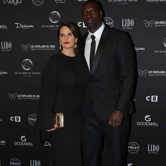 Omar Sy et sa femme Hélène au photocall de la 11ème cérémonie des Globes de Cristal au Lido à Paris le 30 janvier 2017. © CVS / Bestimage