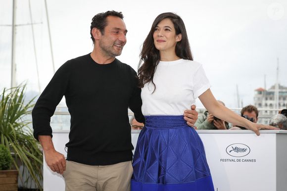 Le réalisateur Gilles Lellouche et l'actrice Mélanie Doutey assistent au photocall de 'Sink Or Swim (Le Grand Bain)' lors de la 71e édition du Festival de Cannes au Palais des Festivals  à Cannes, France. Photo par Shootpix/ABACAPRESS.COM