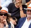 "Il est très tolérant. On s'entend très bien. Il me fait des petits plats savoureux, sans viande. Et des plats avec du poulet à ma chienne. Je suis heureuse", confie-t-elle.

Guy Savoy et sa compagne Laetitia Barlerin -  Les célébrités dans les tribunes lors des Internationaux de France de tennis de Roland-Garros 2026, le 31 mai 2026.
© Dominique Jacovides / Bestimage