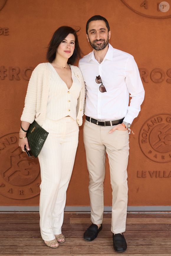 Jimmy Mohamed et sa femme Souailla au village lors des Internationaux de France de tennis de Roland Garros 2024, à Paris, France, le 26 mai 2024.
© Jacovides-Moreau/Bestimage