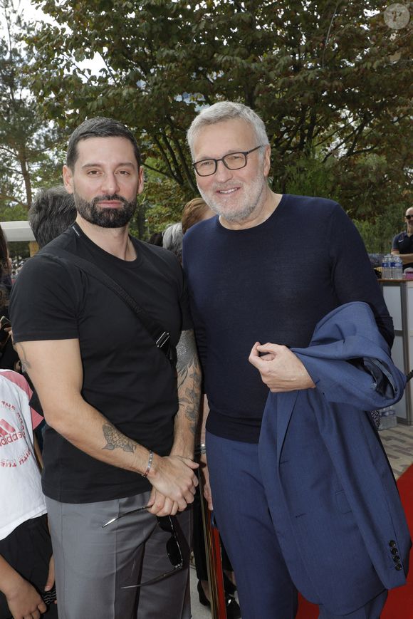 Exclusif - Hugo Manos et son compagnon Laurent Ruquier 
I - Inauguration de la place Line Renaud a Rueil-Malmaison le 22 Juin 2024.
© Jlppa / Bestimage