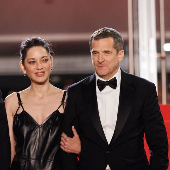 Marion Cotillard et Guillaume Canet - Descente des marches du film " Karma " lors du 79ème Festival International du Film de Cannes. © Jacovides-Moreau / Bestimage