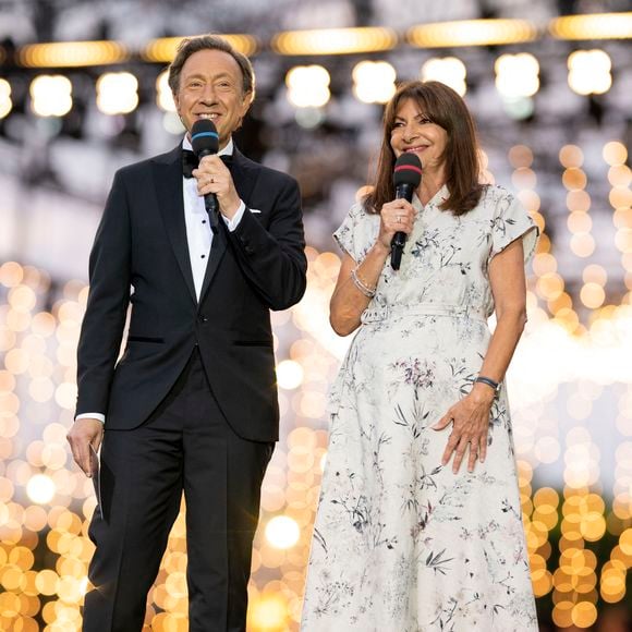 Chef d’équipe, il a été porté par la solidarité d’un groupe soudé.

Stéphane Bern, Anne Hidalgo lors de la 13ème édition du Concert de Paris aux pieds de la Tour Eiffel à l’occasion de la fête nationale du 14 juillet proposé par Radio France, France Télévisions, la Ville de Paris, et Électron Libre Productions. © Perusseau / Clovis / Bestimage