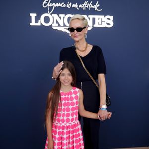 Exclusif - Adriana Karembeu et sa fille Nina lors de la 12ème édition du Longines Paris Eiffel Jumping sur le Champ-de-Mars à Paris le 21 juin 2026.

© Tiphaine Lebely / Bestimage