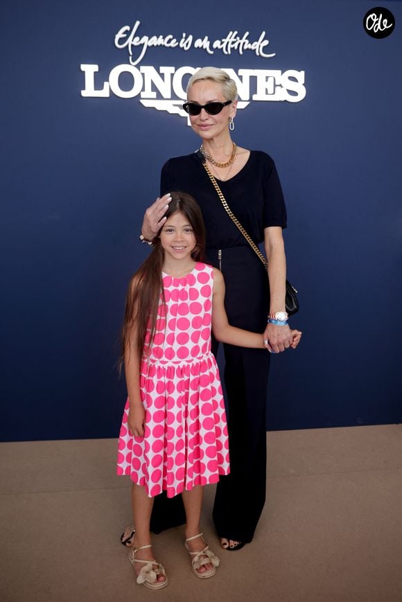 Exclusif - Adriana Karembeu et sa fille Nina lors de la 12ème édition du Longines Paris Eiffel Jumping sur le Champ-de-Mars à Paris le 21 juin 2026.

© Tiphaine Lebely / Bestimage