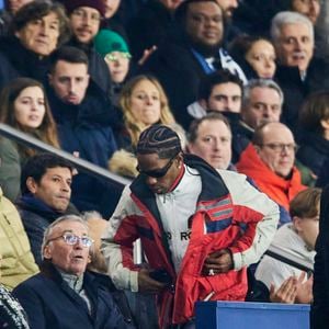 Travis Scott - Célébrités assistent au match de Ligue des champions entre le PSG et Manchester City (4-2) au Parc des Princes à Paris le 22 janvier 2025. © Cyril Moreau/Bestimage